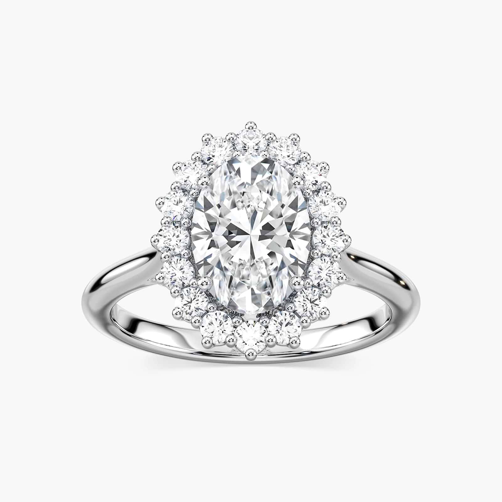 Shown with 3ct Oval Cut Lab Grown Blue Sapphire in 14k White Gold|Vintage style engagement ring with floral design halo around a 3ct lab created blue sapphire in 14k white gold