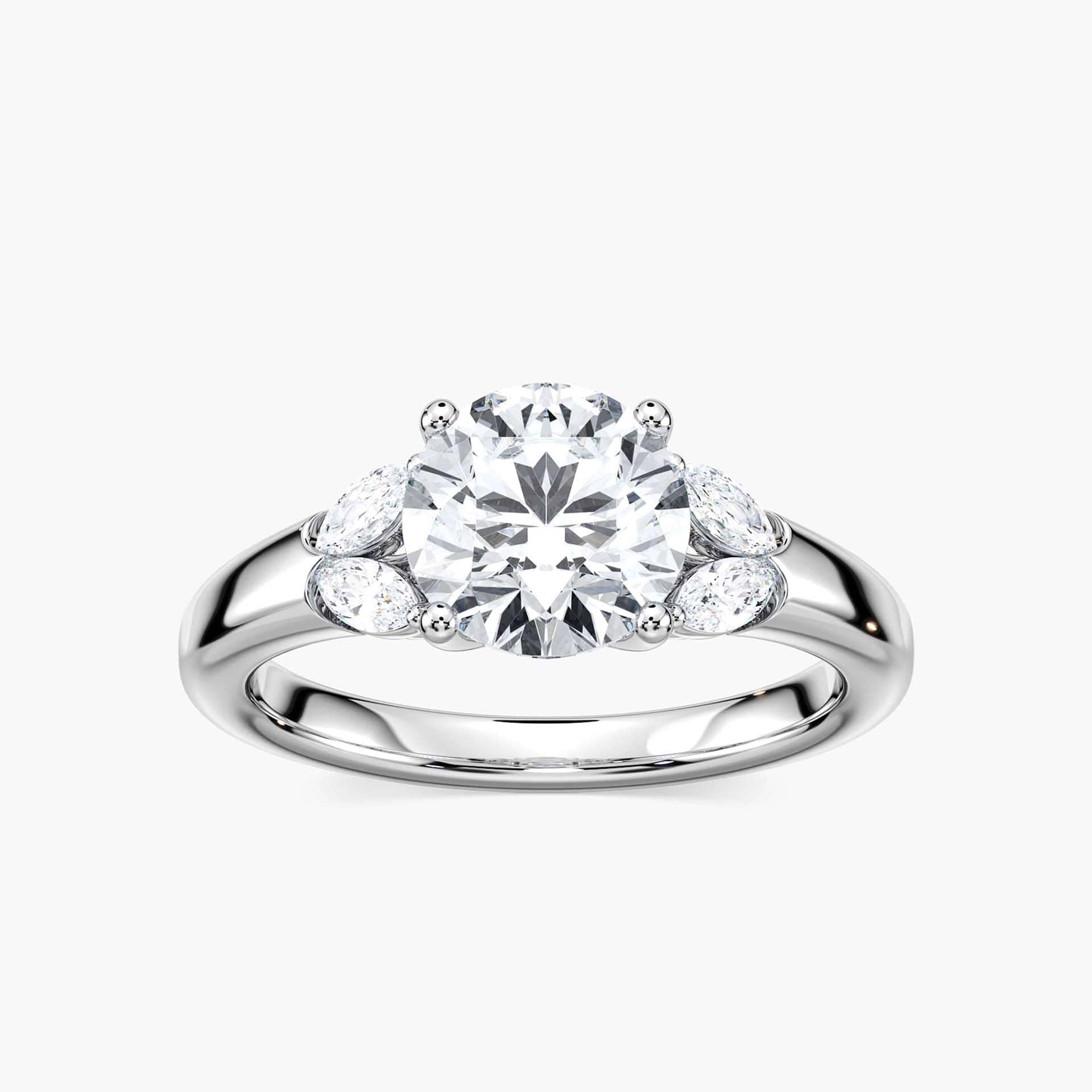 Shown with 0.75ct Round Cut Lab Grown Diamond Center in 14k Rose Gold|Affordable diamond accented engagement ring with 0.75ct round cut lab grown diamond center and 0.20ctw marquise cut side stones in 14k rose gold