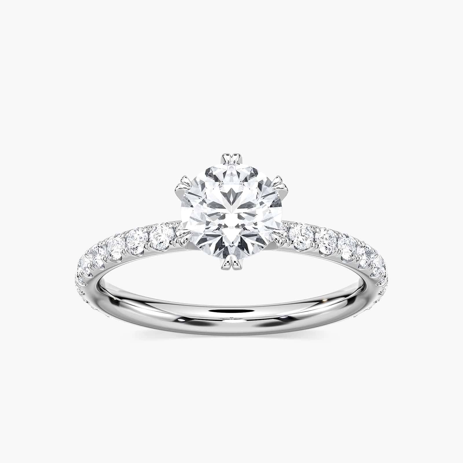 Shown here with a 1.0ct Round Cut Lab Grown Diamond center stone in 14K Yellow Gold|diamond accented 6 prong head engagement ring with round cut lab grown diamond center stone set in 14k yellow gold recycled metal