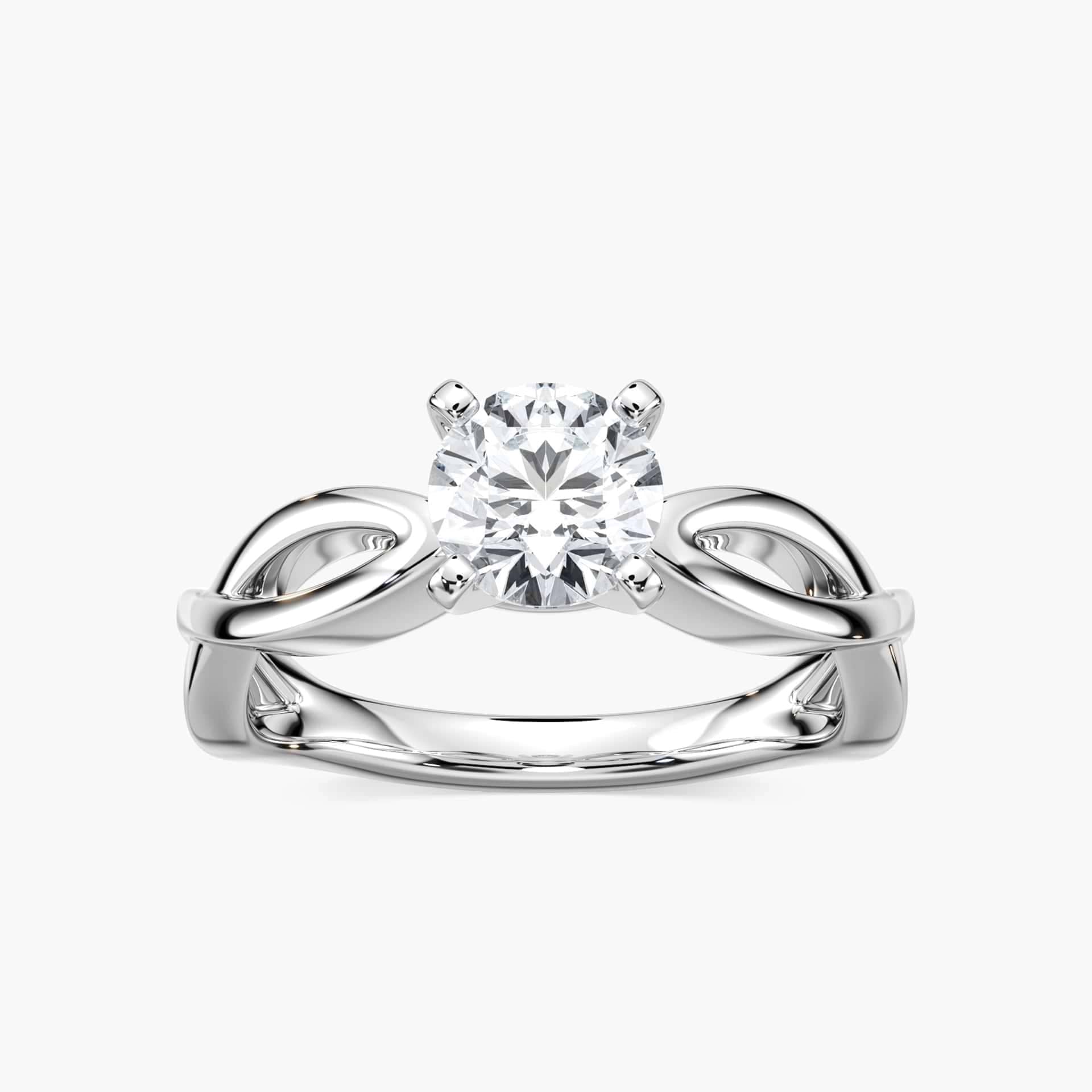 Shown with 1ct Pear Cut Lab Grown Diamond in 16k White Gold|Unique solitaire engagement ring with a 1ct pear cut lab grown diamond in twisted metal design 16k white gold band