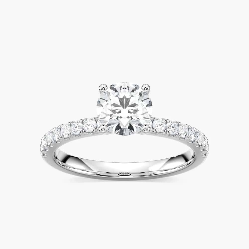 Shown here with a 1.0ct Round Cut Lab Grown Diamond center stone in 14K Yellow Gold|diamond accented engagement ring with a pinched hidden halo set with a 1 carat round cut lab grown diamond in 14k yellow gold metal