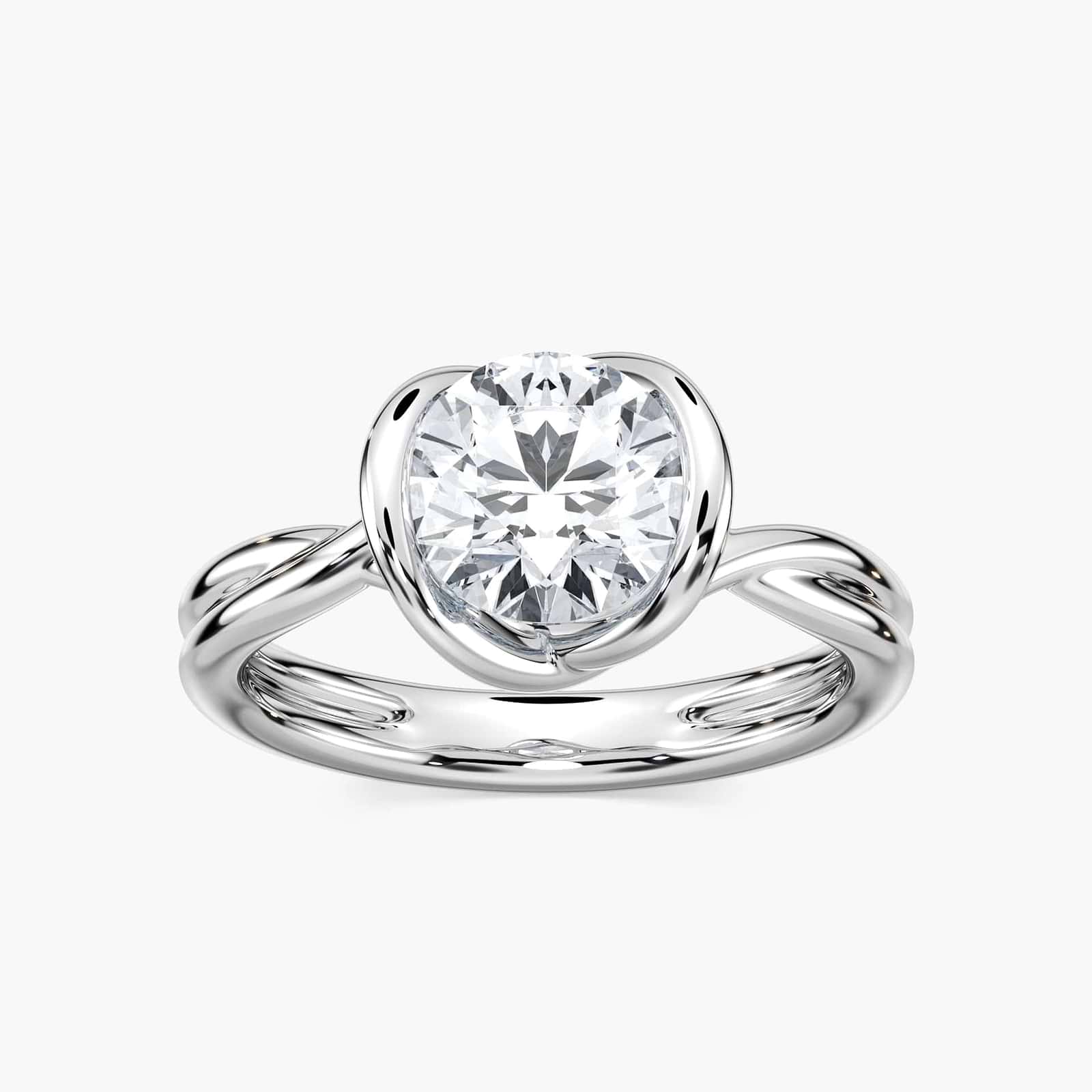 Shown with 1ct Round Cut Lab Grown Diamond in Platinum|Unique contemporary solitaire engagement ring with twisted band design holding a 1ct round cut lab grown diamond in platinum setting