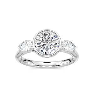 Nova 2 ½ ctw Round Lab Grown Diamond Bezel Set Three Stone Engagement Ring