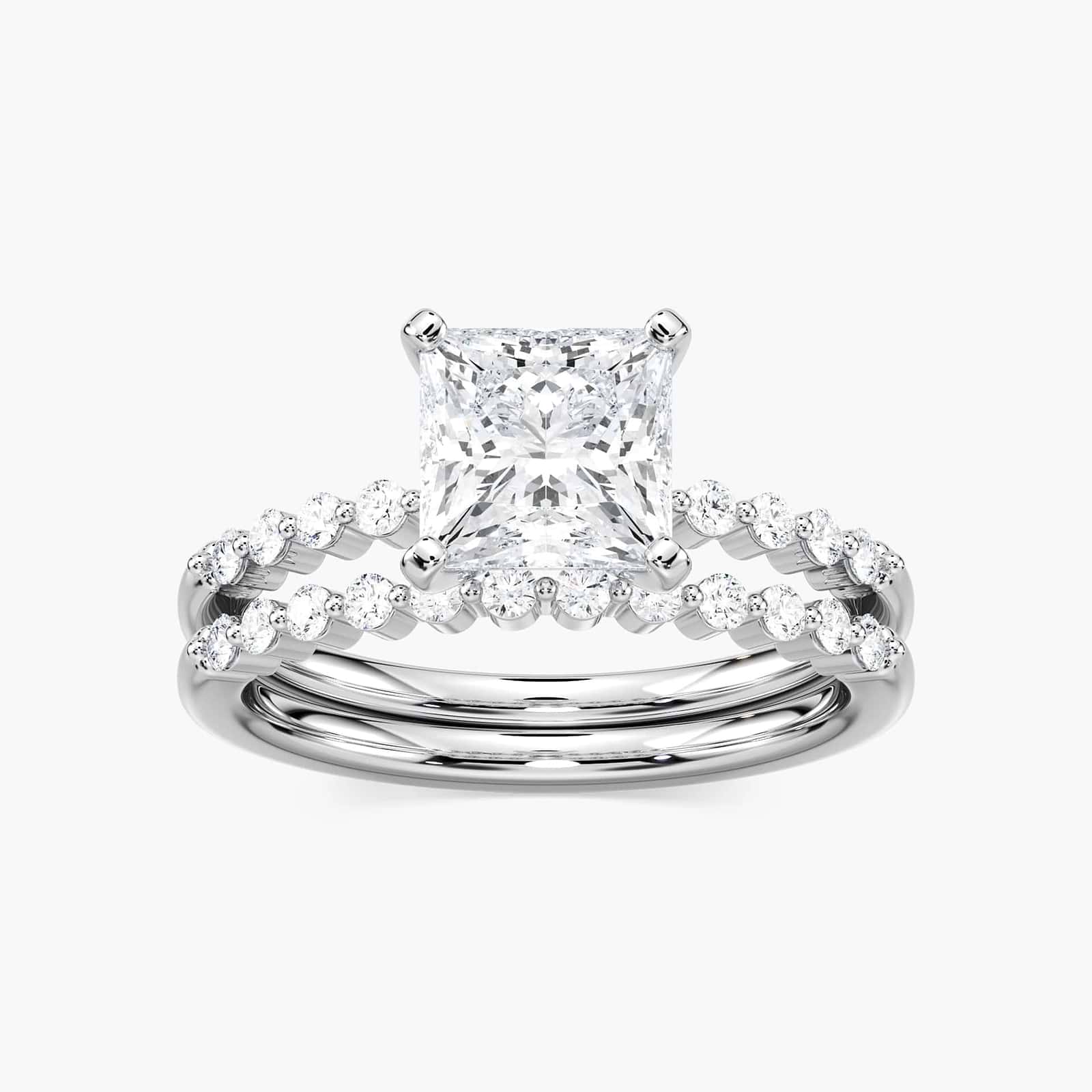 Shown with a 1.0ct Round cut Lab-Grown Diamond with accenting diamonds on the band in recycled 14K white gold with matching wedding band, can be purchased together for a discounted price | diamond accented engagement ring Shown with a 1.0ct Round cut Lab-Grown Diamond with accenting diamonds on the band in recycled 14K white gold with matching wedding band