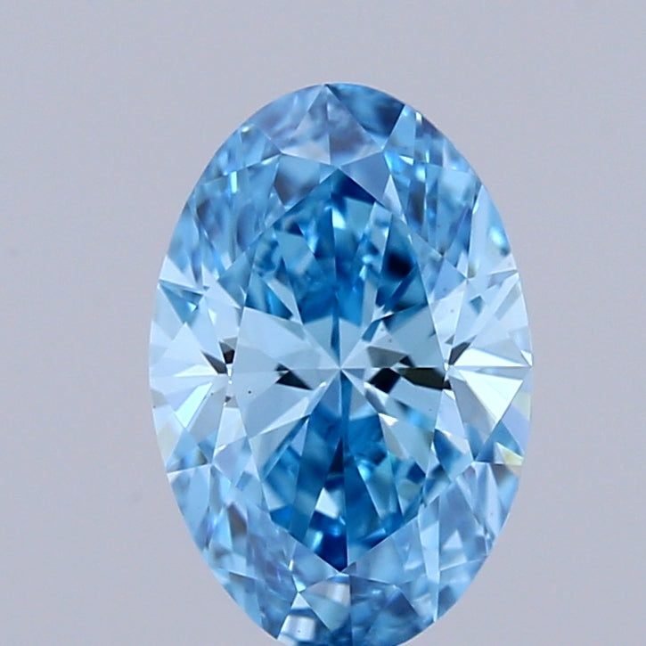 0.95 Carat Oval Shaped, Ideal Cut, FANCY VIVID BLUE Color, VS1 Clarity, IGI Certified Lab Grown Diamond