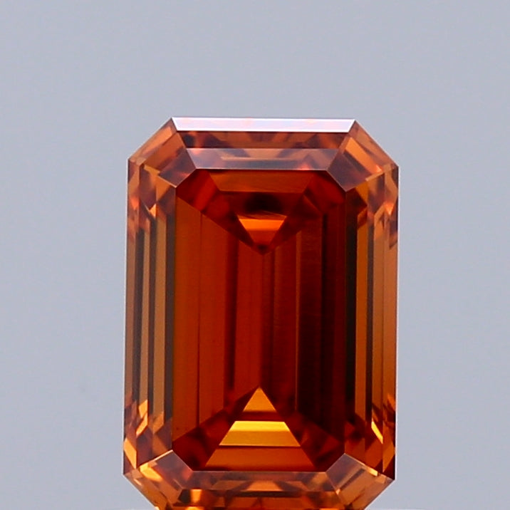 1.06 Carat Emerald Shaped, Ideal Cut, FANCY VIVID ORANGE Color, VVS2 Clarity, IGI Certified Lab Grown Diamond