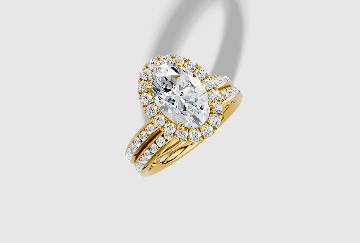 2.66 ctw Oval Cut Lab Grown Diamond Channel Classic Halo Engagement Ring in 18K Gold and 0.35 ctw Matching Band