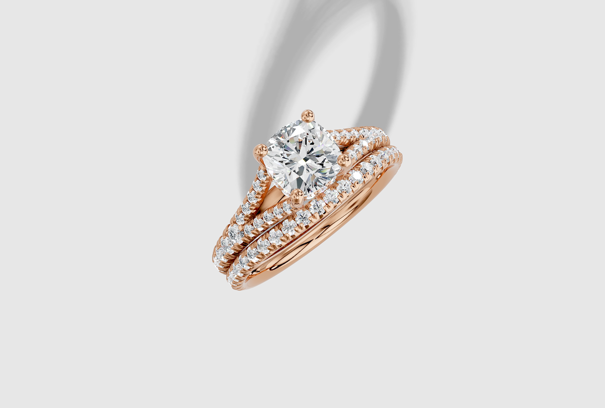 1.39 ctw Cushion Cut Lab Grown Diamond French Pave Split Shank Hidden Halo Engagement Ring in 14K Gold and 0.30 ctw Matching Band