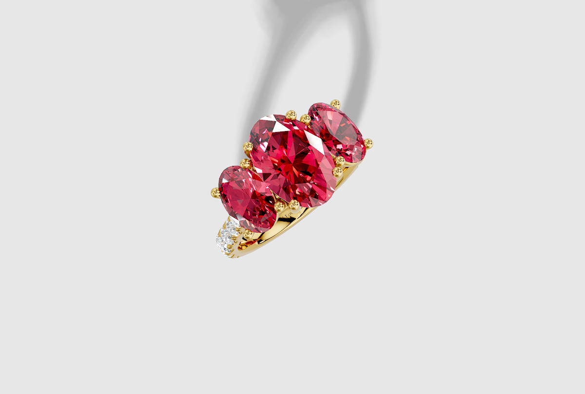 Oval Cut Micro Prong Trellis Three Stone Ring in 18K Gold