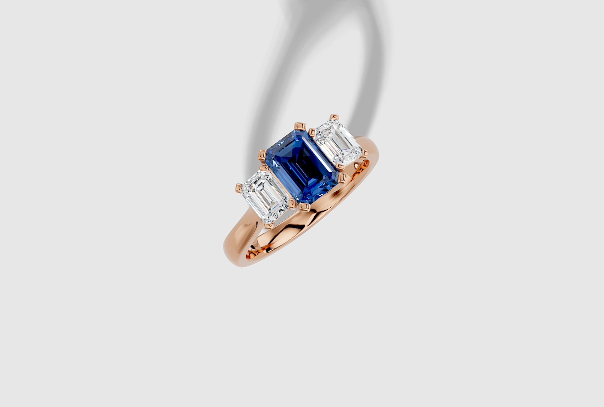 Emerald Cut Standard Trellis Three Stone Ring in 18K Gold