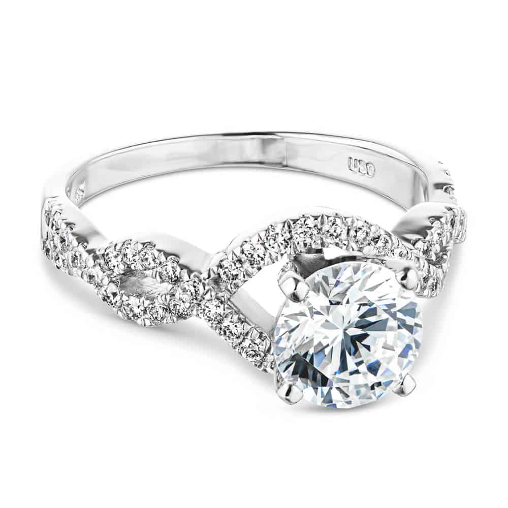 Shown with 1ct Round Cut Lab Grown Diamond in 14k White Gold|Unique twisted wavy engagement ring with diamond accented band and 1ct round cut lab grown diamond in 14k white gold