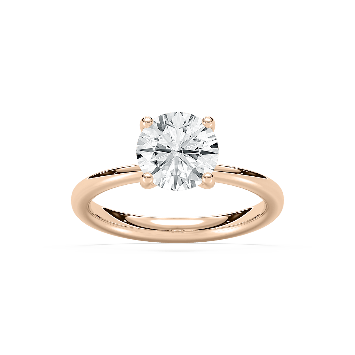 Xoe Tapered Round Solitaire Ring in Rose Gold