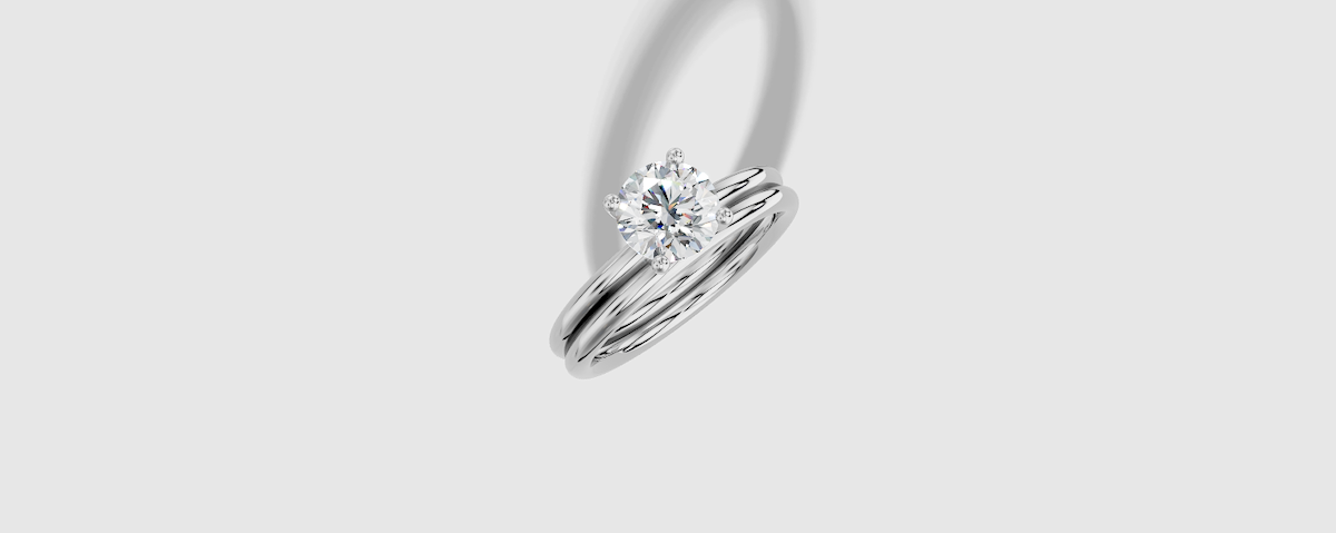 1.00 ctw Round Cut Lab Grown Diamond Standard Classic Prong Set Engagement Ring in Platinum and Matching Band