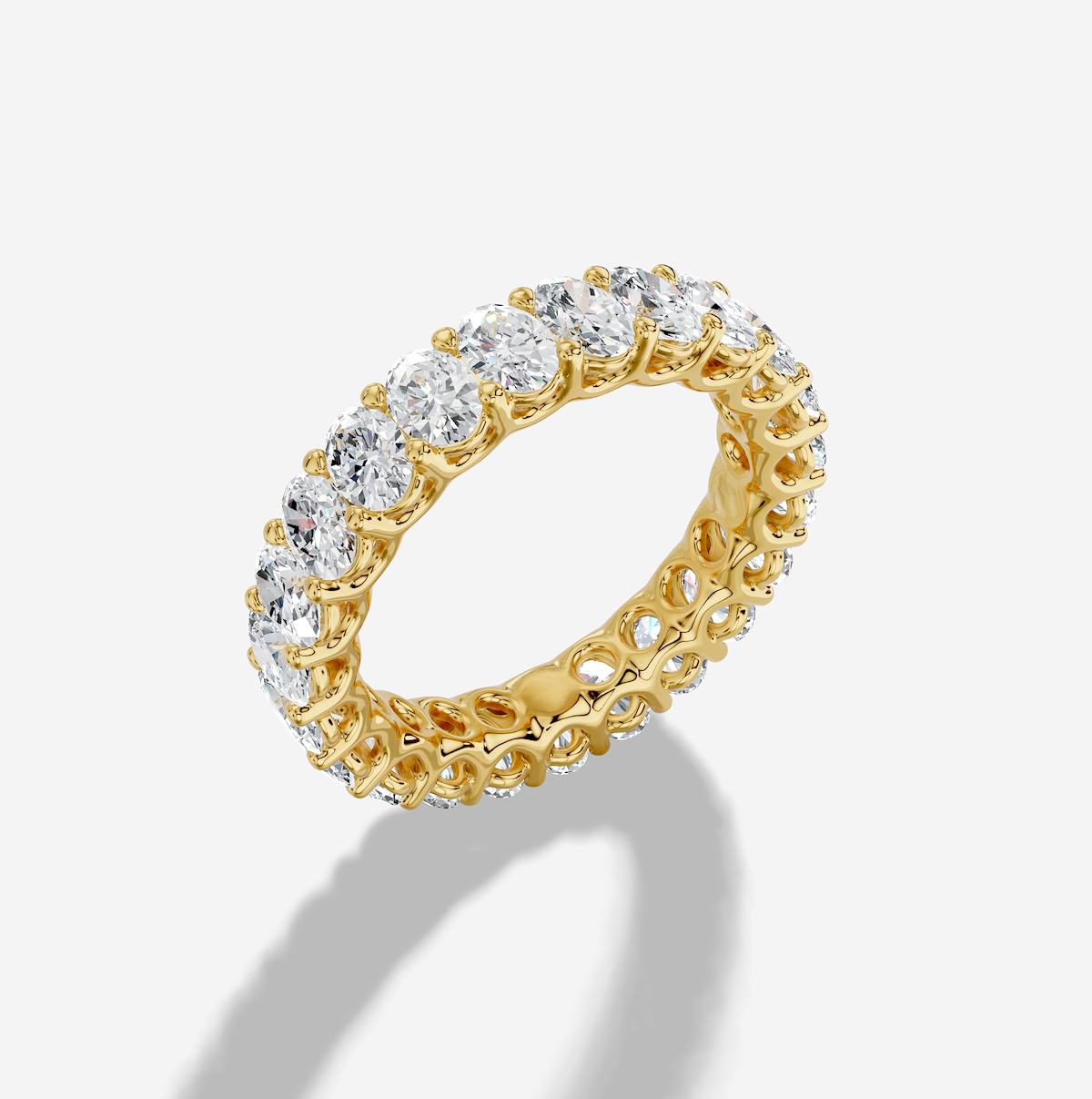 Oval Cut Lab Grown Diamond Shared Prong Eternity Band in 18K Gold