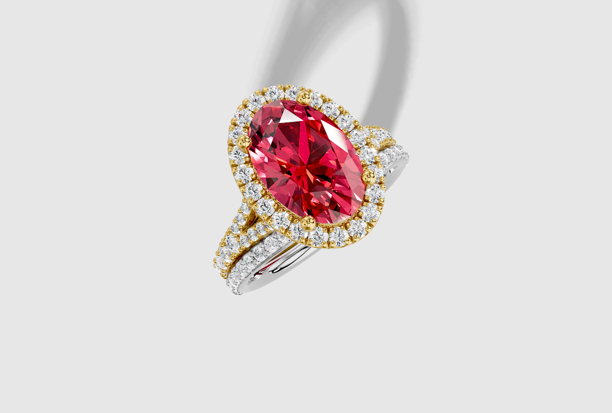 11.0 x 8.0 mm Oval Cut Lab Grown Ruby Shared Prong Split Shank Halo Engagement Ring in 18K Gold and 0.31 ctw Matching Band
