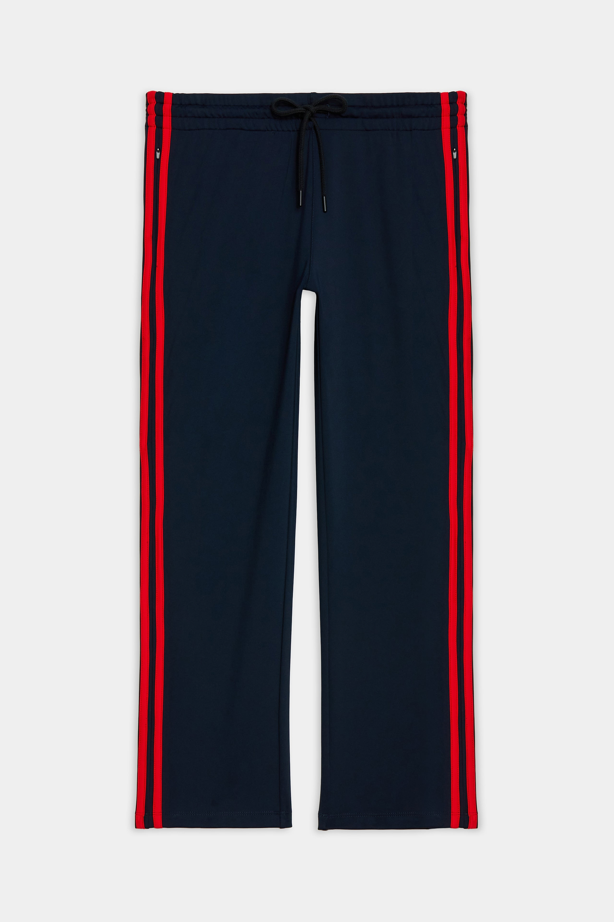 Navy blue track pants with red side stripes and an elastic waistband with a black drawstring, laid flat on a white background.