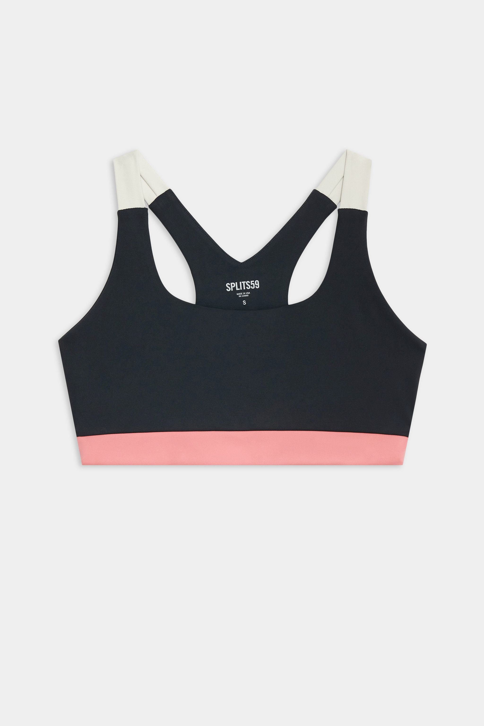 A black sports bra with white shoulder straps and a pink band at the bottom, displayed flat on a white background.