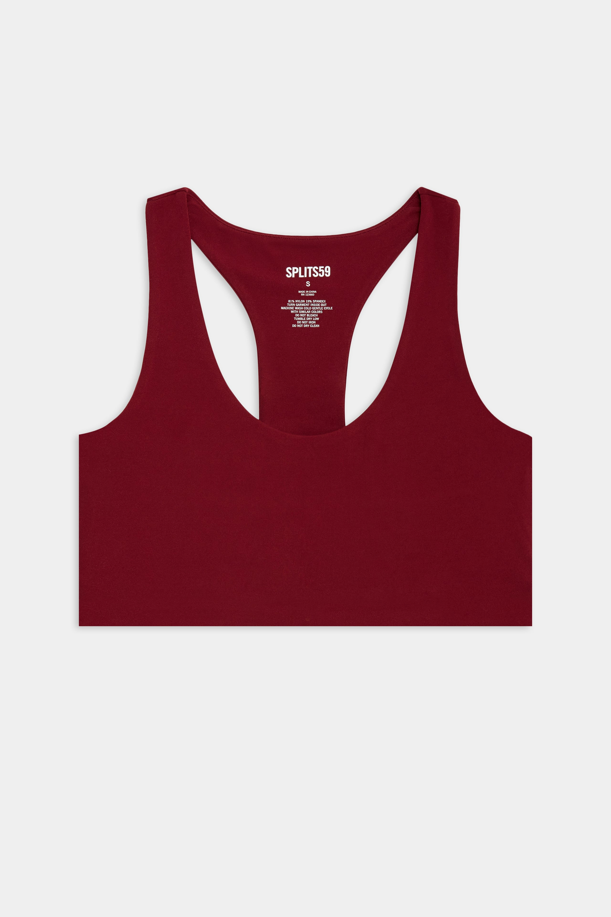 Burgundy racerback sports bra laid flat on a white background.