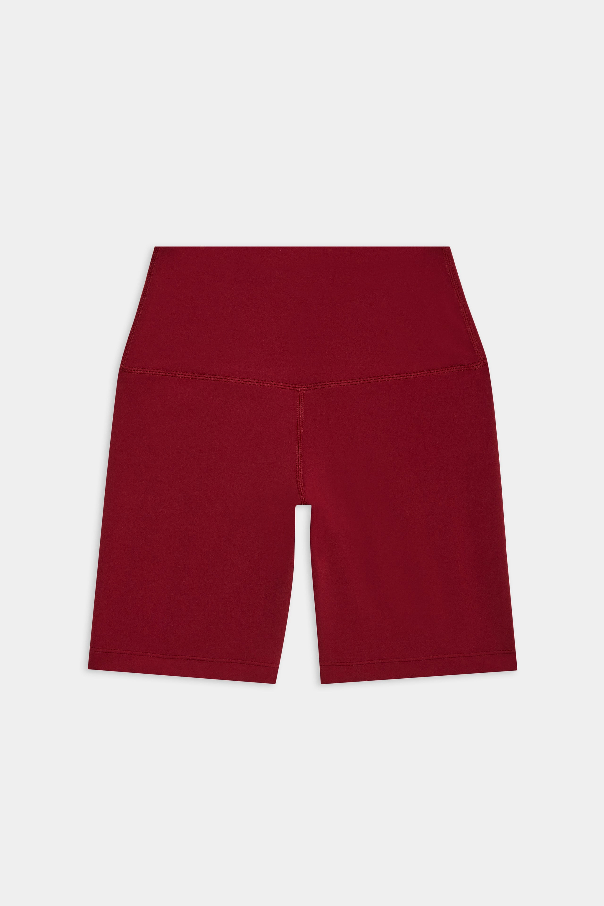 High-waisted, burgundy bike shorts displayed flat against a white background.