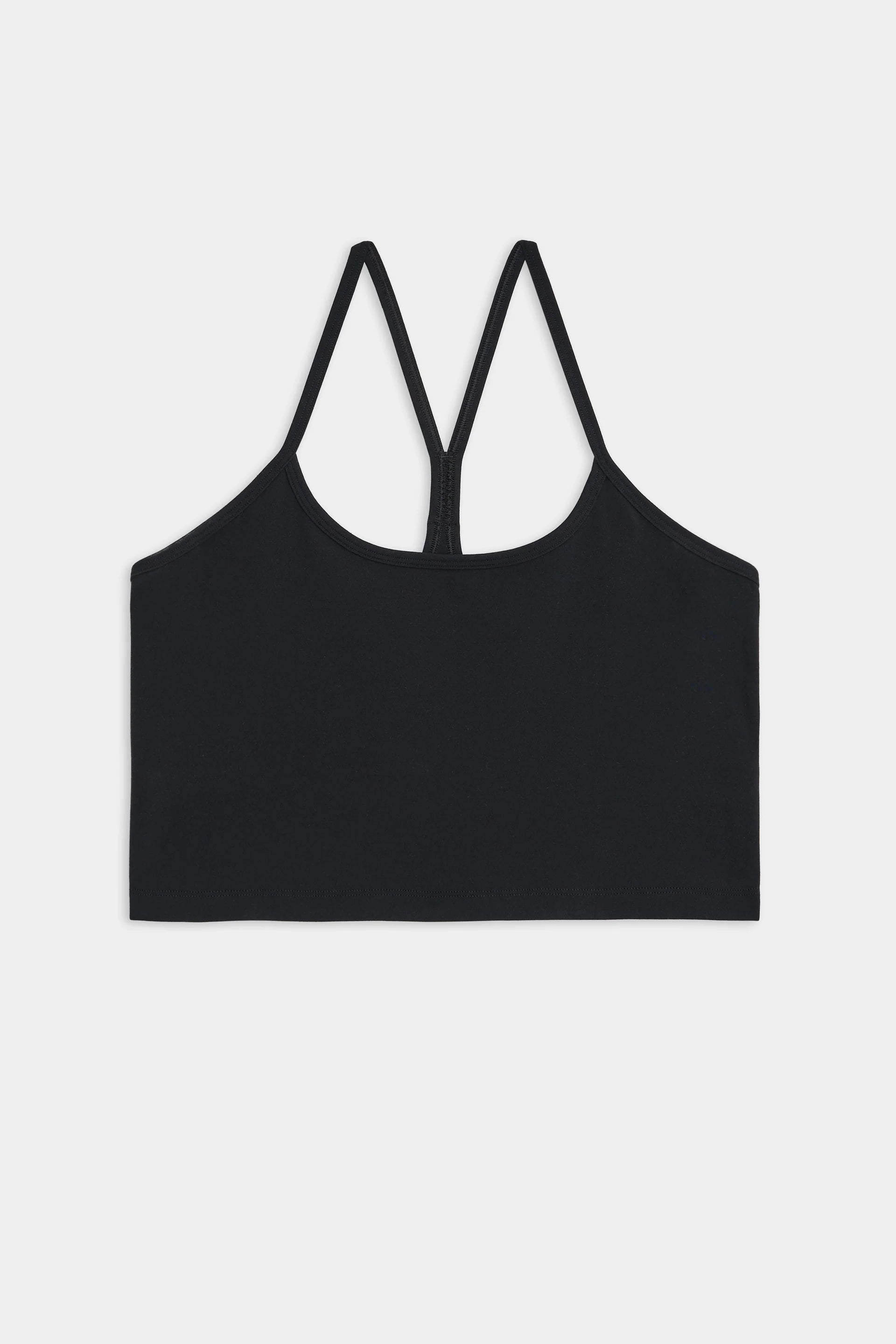 A plain black racerback bralette with thin straps, displayed on a white background.