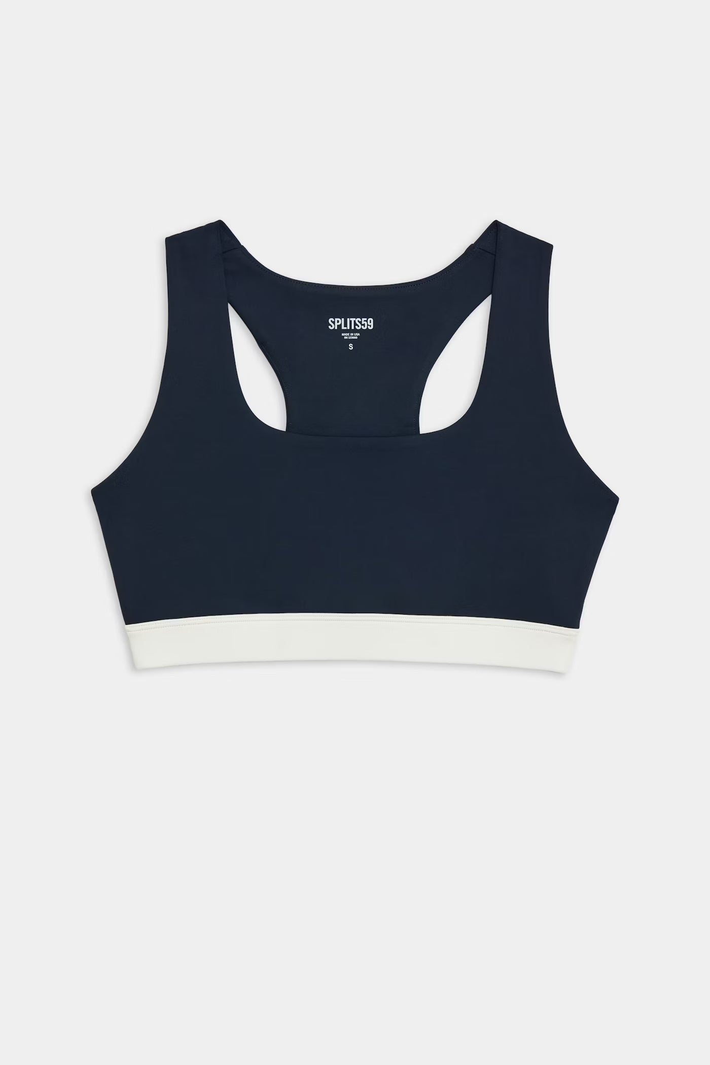 Navy blue sports bra with a white elastic band at the bottom, racerback style, displayed flat on a white background.