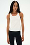 Woman wearing the SPLITS59 Mel Airweight Lite Tank in white, standing against a plain white background—ideal for Pilates or hot yoga.