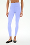 A person wears SPLITS59 Miles High Waist Rigor 7/8 leggings in Purple Haze/White with black ballet flats, standing against a plain white background.