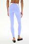 Model wears SPLITS59 Miles High Waist Rigor 7/8 leggings in Purple Haze/White, paired with black ballet flats and small ankle tattoos, standing against a plain white background—ideal for yoga or gym workouts.