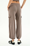 Person wearing SPLITS59 Nico Airweight Cargo Pant in Lentil and black sneakers, shown from the back against a white background—a lightweight, versatile option ideal for workouts.