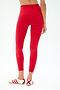 A person wearing SPLITS59 Easton Rigor High Waist 7/8 leggings in Pirate Red/Indigo and white sneakers with red stripes is seen from the back against a plain background.