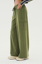 Person wearing the SPLITS59 Alex Airweight Cargo Pant in Olive, featuring a drawstring waist and side pockets made of durable nylon, paired with light-colored sneakers.