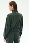 A person seen from behind, head turned left, wears the Peaches Airweight Cargo Jacket - Military by SPLITS59.