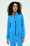Wearing the SPLITS59 Fox Techflex Jacket in Riviera/White, a person with curly hair shows off retro style in matching blue and white activewear, standing against a simple light background.