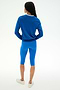 A person with long hair stands facing away, wearing the SPLITS59 Bonnie Knit Half Zip in Classic Blue/White, paired with blue knee-length nylon leggings and white shoes, against a plain white background.