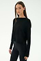 A woman with straight brown hair wears the SPLITS59 Djuna Long Sleeve - Black, paired with black leggings, against a plain white background—ideal for cool weather workouts and stylish women's activewear.