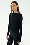 A woman with straight brown hair wears the SPLITS59 Djuna Long Sleeve - Black, paired with black leggings, against a plain white background—ideal for cool weather workouts and stylish women's activewear.