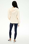 A person stands facing away against a plain white background, wearing the SPLITS59 Stella French Terry Oversized Hoodie in Creme, made from 100% cotton, paired with navy leggings and white athletic shoes.