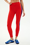 Wearing SPLITS59's Clare High Waist Rigor 7/8 leggings in Lotus Red/Cobalt, featuring blue side stripes, this look is ideal for any workout against a light background.