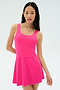 A woman wearing the SPLITS59 Martina Rigor Dress in Berry stands against a plain light background, looking at the camera.