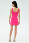 A person stands against a light background, facing away from the camera, wearing the SPLITS59 Martina Rigor Dress in Berry with sneakers.