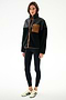 Woman wearing the SPLITS59 Skylar Sherpa Jacket - Black/Toffee with black leggings and white sneakers, standing against a plain white background.