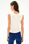 A woman faces away, wearing the SPLITS59 Nikki Jersey Tank - White and blue spandex athletic leggings against a plain white background.