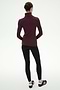 A person stands with their back to the camera, wearing the SPLITS59 Jackson Rib Full Length Turtleneck in Dark Cherry/Creme, paired with black leggings and black sneakers against a plain white background.