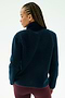 A person with braided hair is seen from the back wearing the SPLITS59 Harris Sherpa Jacket in Indigo/Dark Cherry, paired with burgundy pants, set against a plain light background.