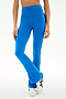 A person is seen wearing the SPLITS59 Raquel High Waist Supplex Flare leggings in Classic Blue/Indigo, which feature bold black side stripes and a comfortable 4-way stretch for ease of movement. Styled with white sneakers, they stand against a plain white background.