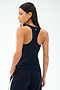 A woman with long dark hair is seen from the back wearing the SPLITS59 Mel Airweight Lite Tank in Indigo against a plain light background.