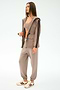 Woman wearing the SPLITS59 Reggie Water Repellent Jacket in Latte/Black, styled with matching joggers, a crop top, and beige sneakers against a plain light background.