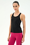 A person stands against a plain background wearing the SPLITS59 Mel Airweight Lite Tank in black and bright pink leggings—an ideal Pilates or hot yoga outfit—looking directly at the camera.