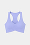 The SPLITS59 Airweight Bra with Ruching in Purple Haze features a racerback design and front ruching, crafted from a soft nylon-spandex blend, shown against a plain white background.