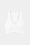 The SPLITS59 Airweight Bra with Ruching in white, made from lightweight performance fabric ideal for hot yoga, is shown against a plain light gray background.